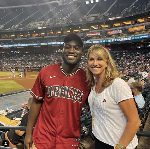 Dr. Kojo in a Diamondbacks jersey at the ballpark