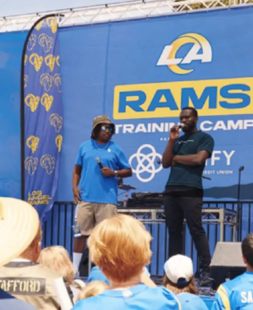 Dr. Kojo on stage at LA Rams training camp