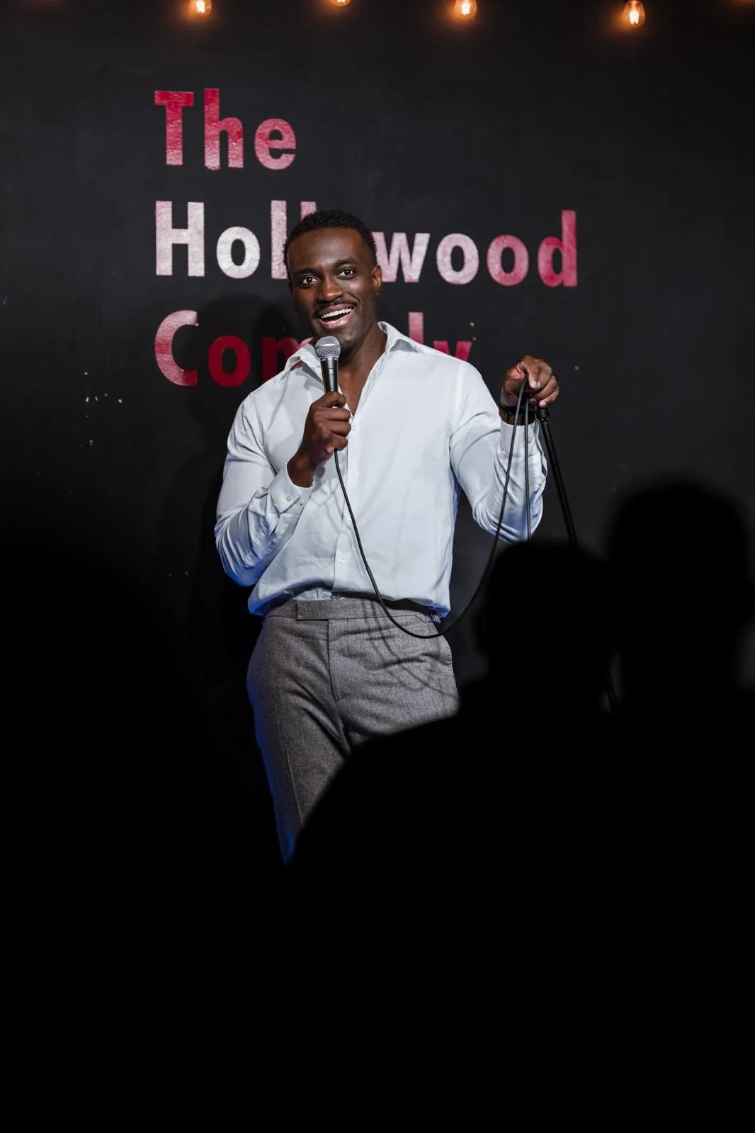 Dr. Kojo on stage at The Hollywood Comedy